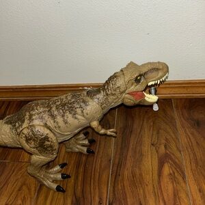 Mattel Brown Jurrasic World Dinosaur Toy with Black Claws, moves mouth/noise